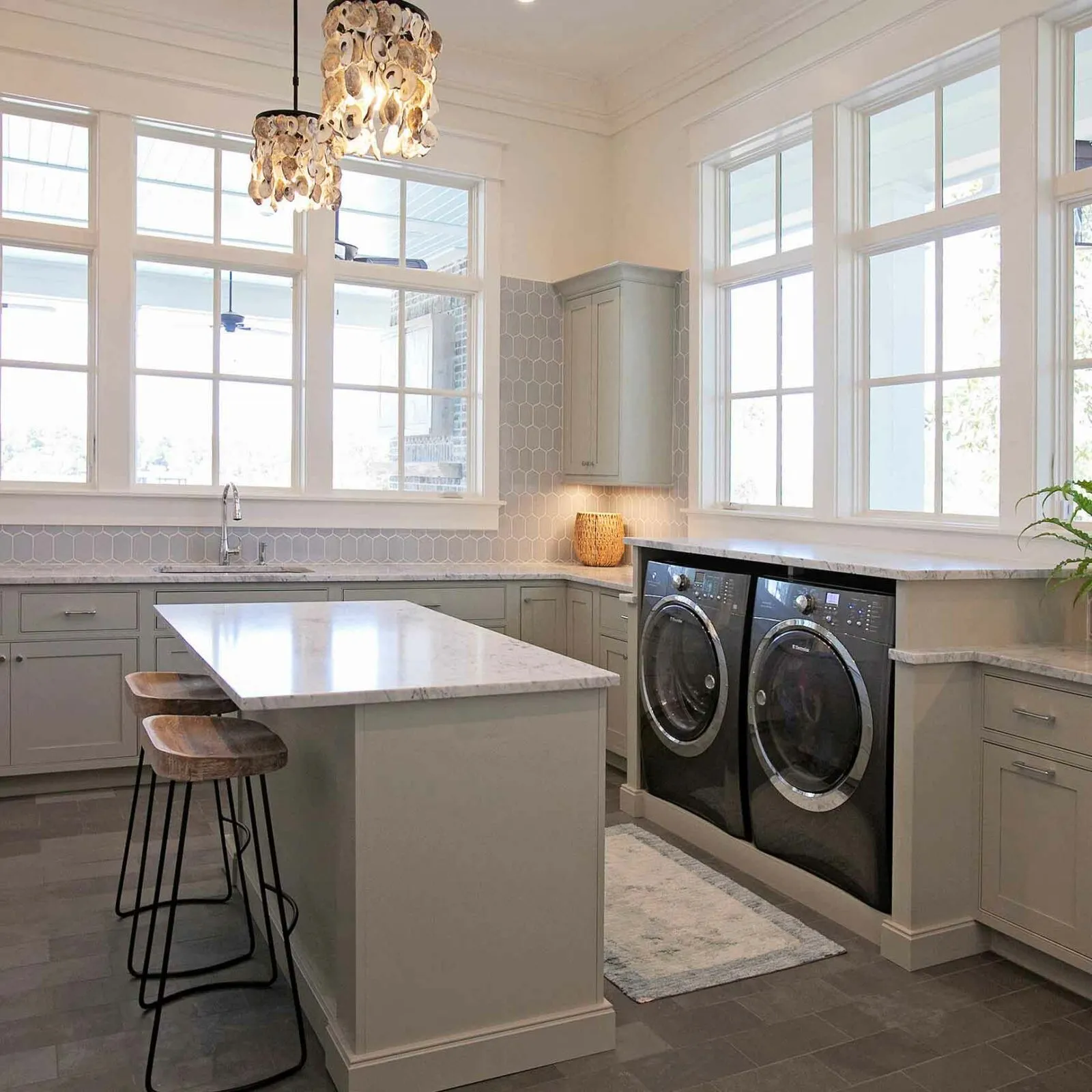 Custom kitchen island and laundry room cabinetry
