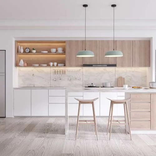 Remodeled kitchen with custom cabinets and stone countertops
